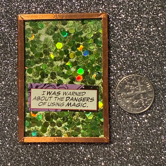 Green glitter "dangers of using magic" handmade magnet
