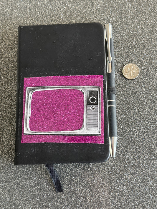 Purple glitter TV notebook
